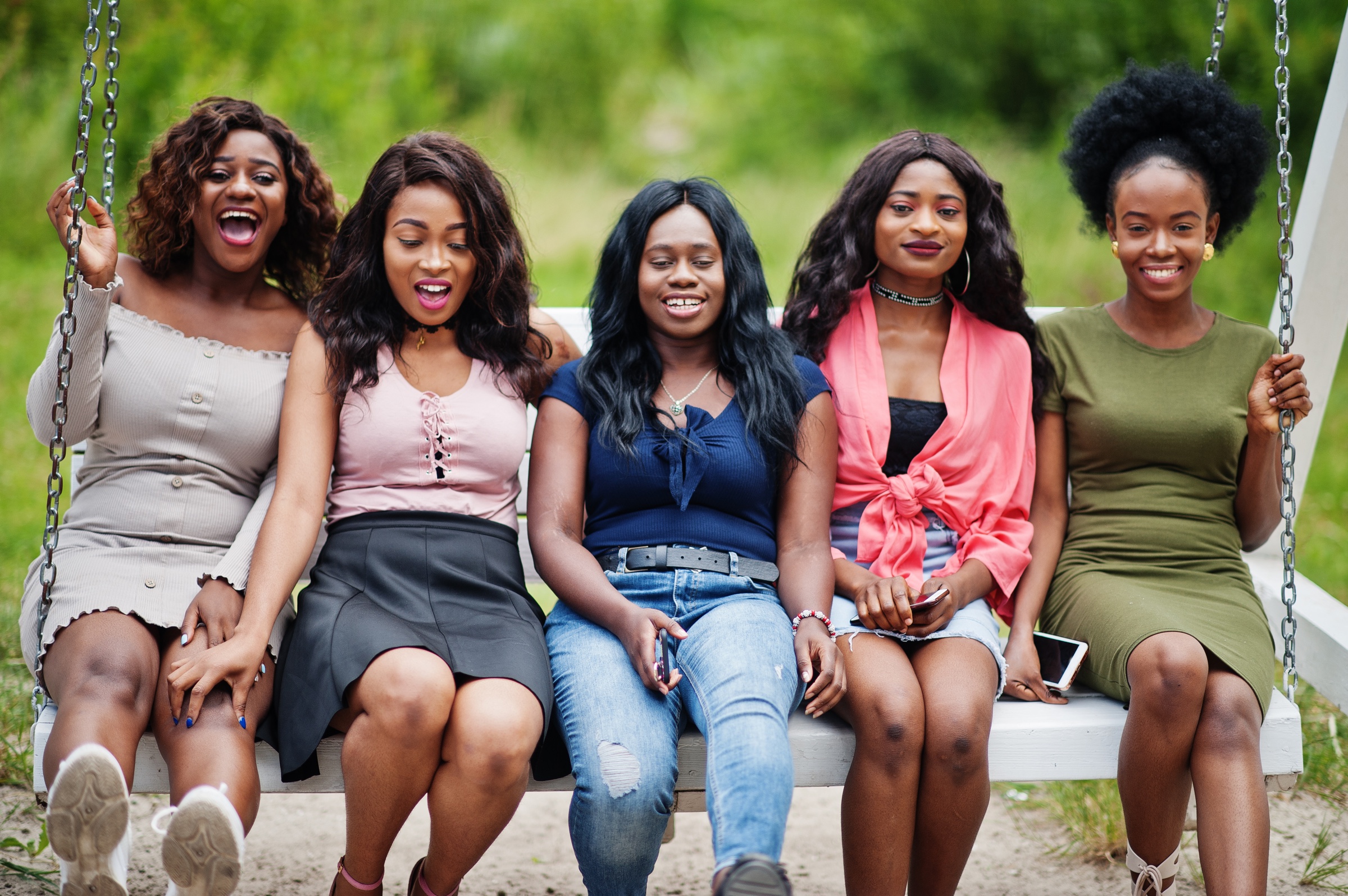 Young women learning and laughing together — a Kuumba Code cohort on The Path